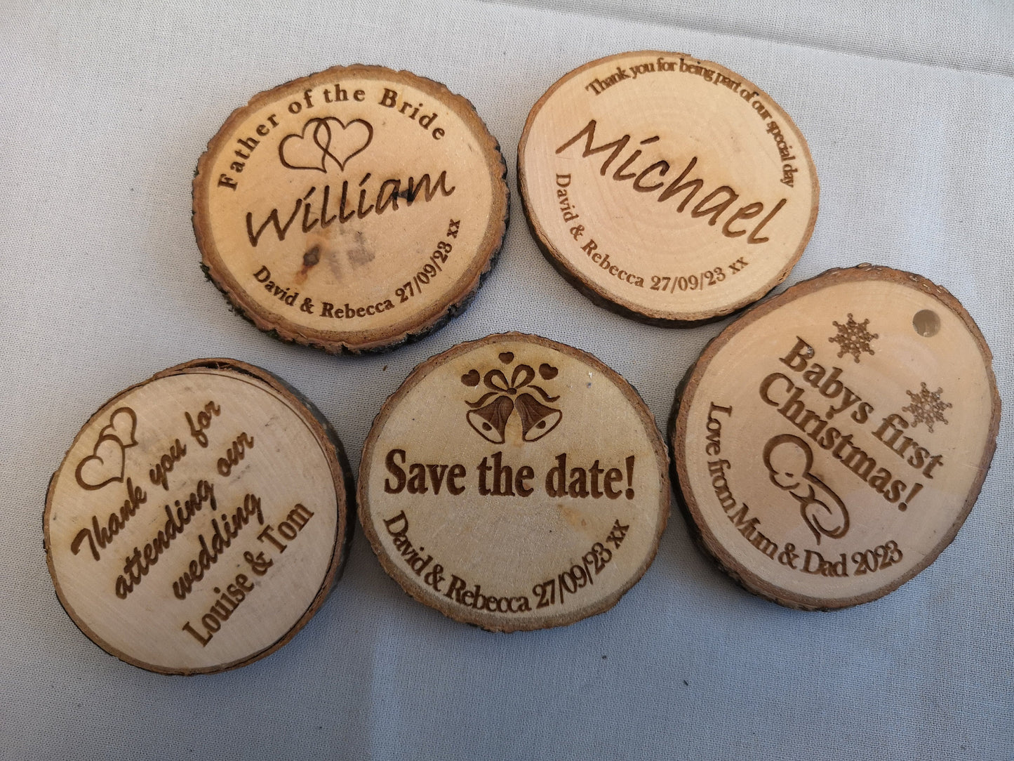 Rustic handmade laser engraved wooden slices.