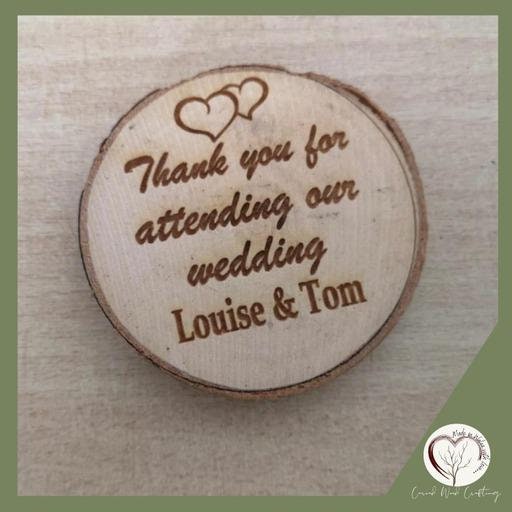 Rustic handmade laser engraved wooden slices.